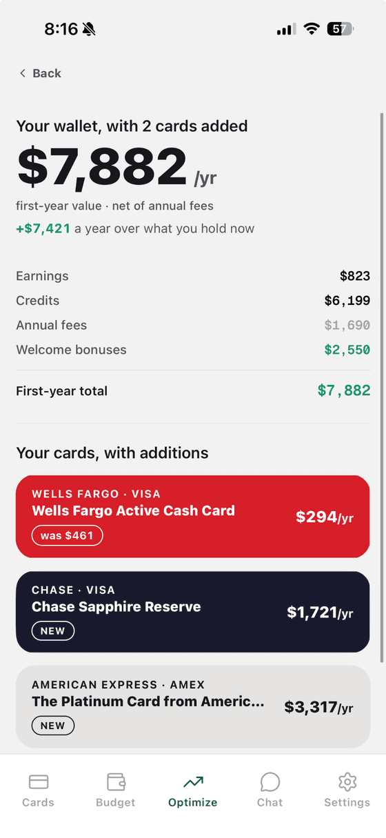 A wallet with 2 cards added, worth $7,882 a year, $7,421 more than the current wallet